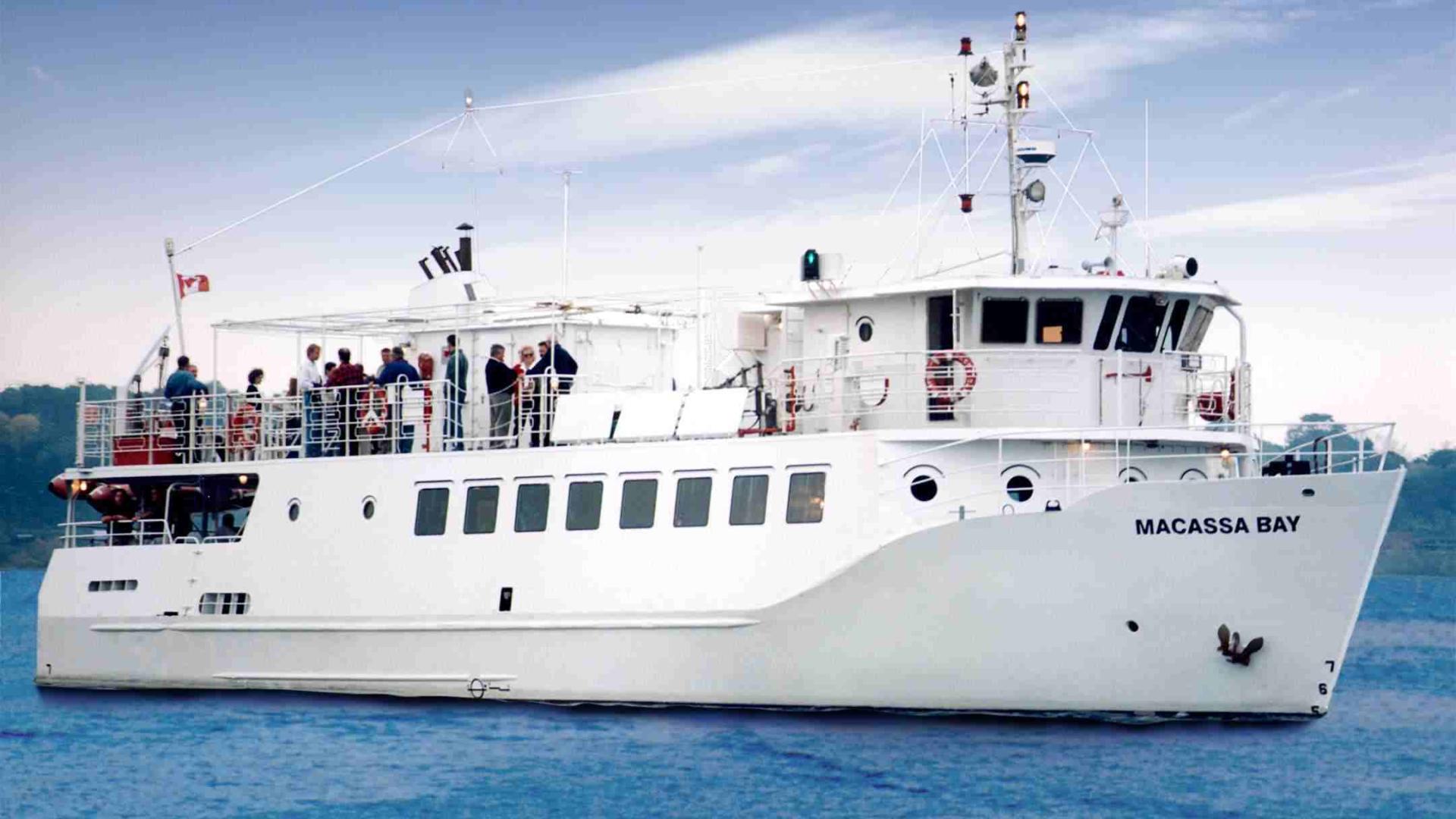 White ferry boat on water. 