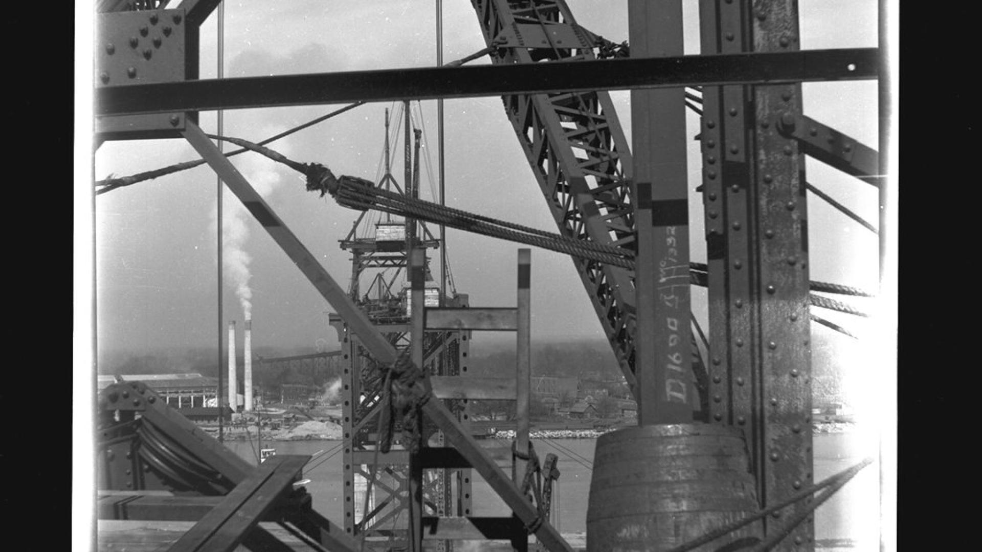 Image of bridge being built. The image is taken from the bridge overlooking to where the bridge is being constructed.