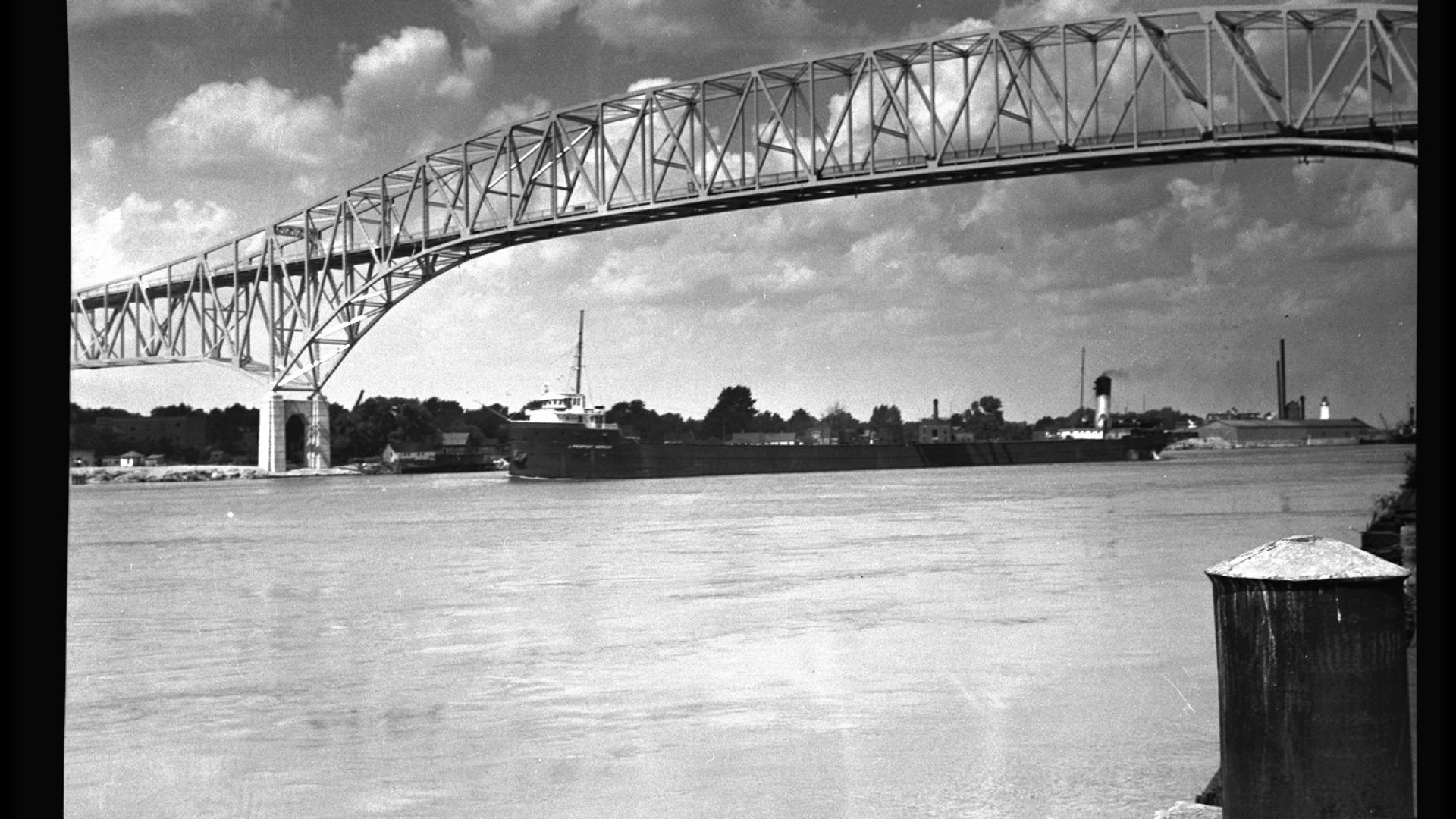 Bridge standing tall over water. 